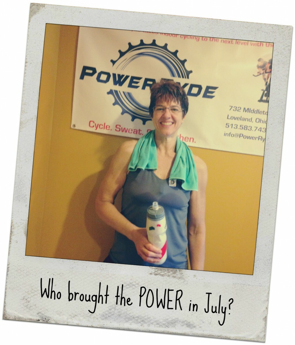 Polaroid style picture of Kim Emery with 'Who Brought the POWER in July'?